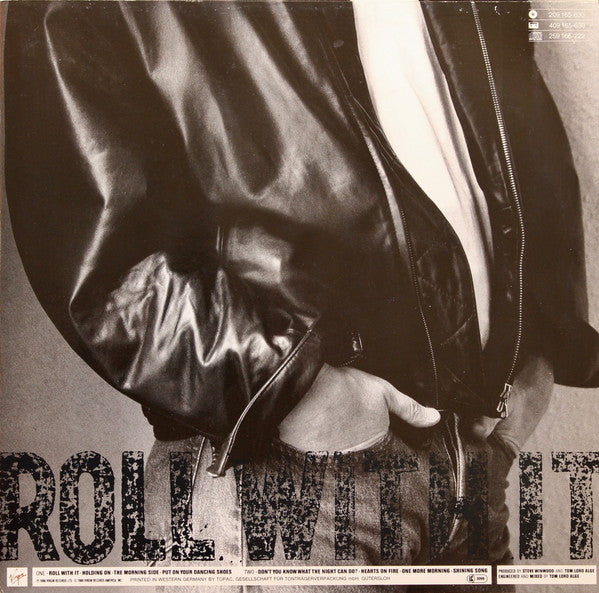 Winwood, Steve ‎– Roll With It