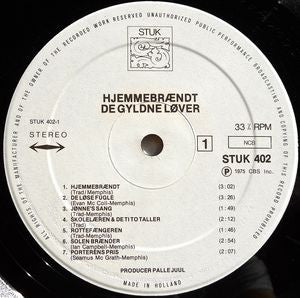 De Gyldne Løver ‎– Hjemmebrændt