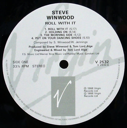 Winwood, Steve ‎– Roll With It